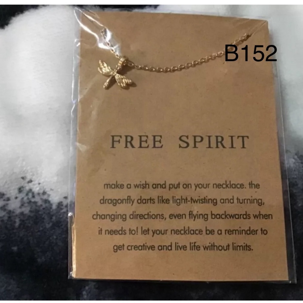 Free spirit gold plated new on card with message of Free Spirit on necklace
